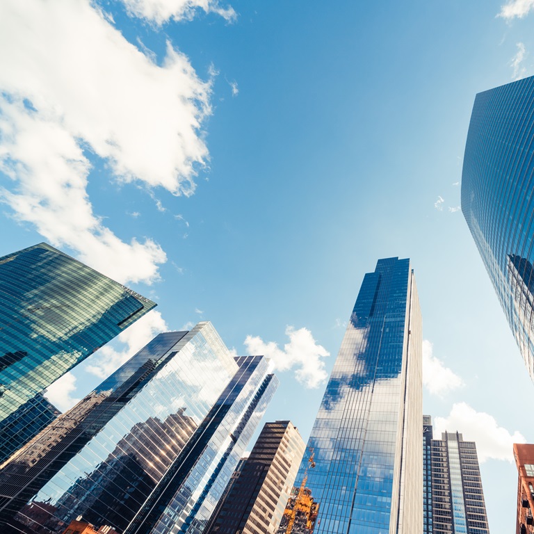 Modern tower buildings or skyscrapers in financial district with cloud on sunny day in Chicago, USA. Construction industry, business enterprise organization, or communication technology concept