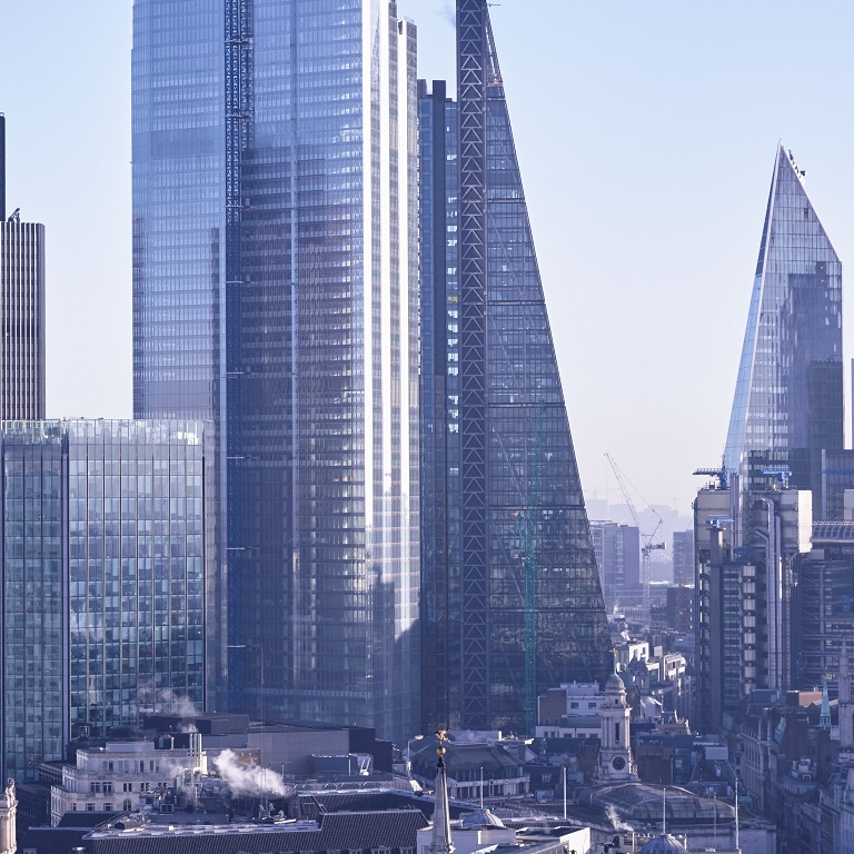 Modern London skyscrapers and the financial district against sky