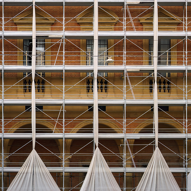 Scaffolding surrounding historic building during restoration process